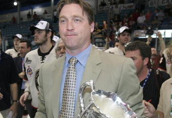 MONCTON, CANADA - MAY 28:  General Manager and head coach of the Quebec Remparts, Patrick Roy, carries the Memorial Cup trophy across the ice after his team defeated the Moncton Wildcats 6-2 in the 2006 Memorial Cup final at the Moncton Coliseum on May 28, 2006 in Moncton, New Brunswick, Canada. The Remparts defeated the Wildcats 6-2.  (Photo by Mike Dembeck/Getty Images)