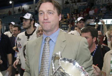 MONCTON, CANADA - MAY 28:  General Manager and head coach of the Quebec Remparts, Patrick Roy, carries the Memorial Cup trophy across the ice after his team defeated the Moncton Wildcats 6-2 in the 2006 Memorial Cup final at the Moncton Coliseum on May 28, 2006 in Moncton, New Brunswick, Canada. The Remparts defeated the Wildcats 6-2.  (Photo by Mike Dembeck/Getty Images)