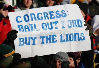 GREEN BAY, WI - DECEMBER 28: Fans hold a sign during a game between the Green Bay Packers and the Detroit Lions on December 28, 2008 at Lambeau Field in Green Bay, Wisconsin. The Packers defeated the Lions 31-21. (Photo by Jonathan Daniel/Getty Images)