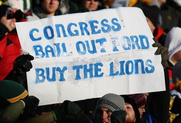 GREEN BAY, WI - DECEMBER 28: Fans hold a sign during a game between the Green Bay Packers and the Detroit Lions on December 28, 2008 at Lambeau Field in Green Bay, Wisconsin. The Packers defeated the Lions 31-21. (Photo by Jonathan Daniel/Getty Images)