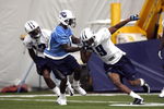 NASHVILLE, TN - MAY 1:  Dominique Edison #19 of the Tennessee Titans is defended by Jason McCourty #30 during the team's minicamp on May 1, 2009 at Baptist Sports Park in Nashville, Tennessee.  (Photo by Joe Murphy/Getty Images)