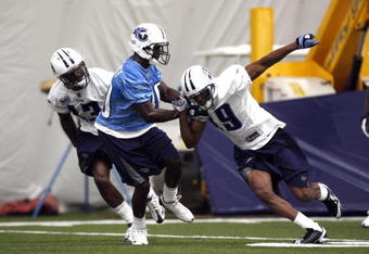 NASHVILLE, TN - MAY 1:  Dominique Edison #19 of the Tennessee Titans is defended by Jason McCourty #30 during the team's minicamp on May 1, 2009 at Baptist Sports Park in Nashville, Tennessee.  (Photo by Joe Murphy/Getty Images)