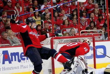 WASHINGTON - MAY 04:  Shaone Morrisonn #26 and Simeon Varlamov #40 of the Washington Capitals drops Jordan Staal #11 of the Pittsburgh Penguins during Game Two of the Eastern Conference Semifinal Round of the 2009 Stanley Cup Playoffs on May 4, 2009 at the Verizon Center in Washington,  DC.  (Photo by Len Redkoles/Getty Images)