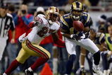 ST. LOUIS, MO - DECEMBER 21: Donnie Avery #17 of the St. Louis Rams catches a pass against Walt Harris #27 of the San Francisco 49ers at the Edward Jones Dome on December 21, 2008 in St. Louis, Missouri.  The 49ers beat the Rams 17-16.  (Photo by Dilip Vishwanat/Getty Images)