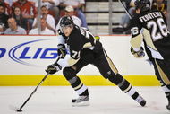 PITTSBURGH - MAY 08: Forward Evgeni Malkin #71 of the Pittsburgh Penguins skates with the puck against the Washington Capitals during Game Four of the Eastern Conference Semifinal Round of the 2009 Stanley Cup Playoffs at Mellon Arena on May 8, 2009 in Pittsburgh, Pennsylvania. (Photo by Jamie Sabau/Getty Images)