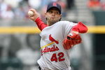 PHOENIX - APRIL 15:  Starting pitcher Joel Pineiro #42 of the St. Louis Cardinals pitches against the Arizona Diamondbacks during the game at Chase Field on April 15, 2009 in Phoenix, Arizona. The Cardinals defeated the Diamondbacks 12-7.  (Photo by Christian Petersen/Getty Images)