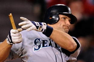 ANAHEIM, CA - APRIL 25:  Russell Branyan #30 of the Seattle Mariners holding the bottom half of his broken bat looks at his one-run single to score Ken Griffey Jr. #24 against the Los Angeles Angels of Anaheim during the seventh inning of the baseball game on April 25, 2009 at Angel Stadium in Anaheim, California.  (Photo by Kevork Djansezians/Getty Images)