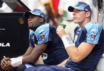 HOUSTON - OCTOBER 21: Vince Young #10 and Kerry Collins #5 of the Tennessee Titans look on from the sidelines during the game against the Houston Texans at Reliant Stadium October 21, 2007 in Houston, Texas. (Photo by Jamie Squire/Getty Images)