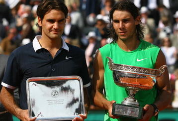 PARIS - JUNE 08:  Roger Federer (L) of Switzerland and Rafael Nadal of Spain with their trophies after the Men's Singles Final match on day fifteen of the French Open at Roland Garros on June 8, 2008 in Paris, France.  (Photo by Julian Finney/Getty Images)