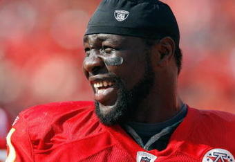 KANSAS CITY - SEPTEMBER 28:  Tamba Hali #91 of the Kansas City Chiefs laughs on the sidelines during the game against the Denver Broncos on September 28, 2008 at Arrowhead Stadium in Kansas City, Missouri. The Chiefs defeated the Broncos 33-19.  (Photo by: Jamie Squire/Getty Images)