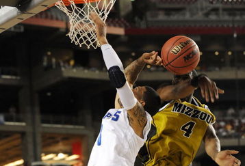 GLENDALE, AZ - MARCH 26:  Guard J.T. Tiller #4 of the Missouri Tigers blocks a shot by guard Roburt Sallie #3 of the Memphis Tigers in the Sweet 16 of the NCAA Division I Men's Basketball Tournament at the University of Phoenix Stadium on March 26, 2009 in Glendale, Arizona.  (Photo by Ronald Martinez/Getty Images)