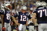 GLENDALE, AZ - FEBRUARY 03:  Tom Brady #12 of the New England Patriots huddles with his team during Super Bowl XLII against the New York Giants on February 3, 2008 at the University of Phoenix Stadium in Glendale, Arizona.  (Photo by Donald Miralle/Getty Images)