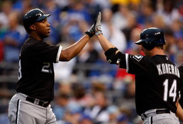 KANSAS CITY, MO - MAY 05:  Jermaine Dye #23 of the Chicago White Sox is congratulated by Paul Konerko #14 after hitting a two-run home run in the third inning against the Kansas City Royals on May 5, 2009 at Kauffman Stadium in Kansas City, Missouri.  (Photo by Jamie Squire/Getty Images)