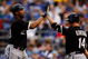 KANSAS CITY, MO - MAY 05: Jermaine Dye #23 of the Chicago White Sox is congratulated by Paul Konerko #14 after hitting a two-run home run in the third inning against the Kansas City Royals on May 5, 2009 at Kauffman Stadium in Kansas City, Missouri. (Photo by Jamie Squire/Getty Images)
