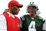 EAST RUTHERFORD, NJ - OCTOBER 26:  Brett Favre #4 of the New York Jets walks off the field and is met by Kansas City Chiefs Head Coach Herman Edwards after a 28-24 win against the Kansas City Chiefs on October 26, 2008 at Giants Stadium in East Rutherford, New Jersey.  (Photo by Al Bello/Getty Images)
