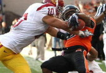 CORVALIS, OR - SEPTEMBER 25:  James Rodgers #8 of the Oregon State Beavers runs for a touchdown against Brian Cushing #10 and Taylor Mays #2 of the Southern California Trojans at Reser Stadium on September 25, 2008 in Corvalis, Oregon.  (Photo by Jonathan Ferrey/Getty Images)