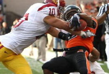 CORVALIS, OR - SEPTEMBER 25:  James Rodgers #8 of the Oregon State Beavers runs for a touchdown against Brian Cushing #10 and Taylor Mays #2 of the Southern California Trojans at Reser Stadium on September 25, 2008 in Corvalis, Oregon.  (Photo by Jonathan Ferrey/Getty Images)