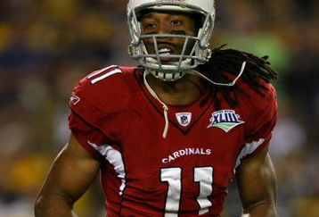 TAMPA, FL - FEBRUARY 01:  Larry Fitzgerald #11 of the Arizona Cardinals catches the ball against the Pittsburgh Steelers during Super Bowl XLIII on February 1, 2009 at Raymond James Stadium in Tampa, Florida.  (Photo by Jamie Squire/Getty Images)