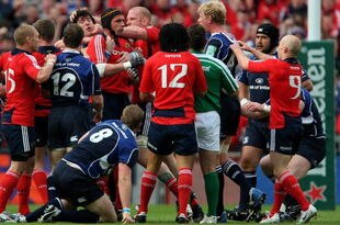 DUBLIN, IRELAND - MAY 02:  Munster forward Alan Quinlan (cap ) is held back from Leinster captain Leo Cullen by Peter Stringer during the Heineken Cup Semi Final between Munster and Leinster at Croke Park on May 2, 2009 in Dublin, Ireland.  (Photo by Stu Forster/Getty Images)