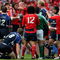 DUBLIN, IRELAND - MAY 02:  Munster forward Alan Quinlan (cap ) is held back from Leinster captain Leo Cullen by Peter Stringer during the Heineken Cup Semi Final between Munster and Leinster at Croke Park on May 2, 2009 in Dublin, Ireland.  (Photo by Stu Forster/Getty Images)