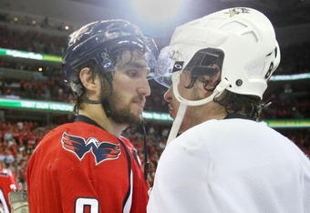 WASHINGTON - MAY 13:  Alex Ovechkin #8 of the Washington Capitals and Sidney Crosby #87 of the Pittsburgh Penguins shake hands after Pittsburgh's 6-2 victory in Game Seven of the Eastern Conference Semifinal  Round of the 2009 Stanley Cup Playoffs at Verizon Center on May 13, 2009 in Washington, DC.  (Photo by Bruce Bennett/Getty Images)