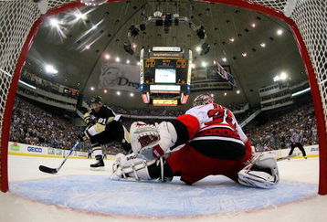 PITTSBURGH - MAY 18:  Miroslav Satan #81 of the Pittsburgh Penguins scores a goal against goaltender Cam Ward #30 of the Carolina Hurricanes during Game One of the Eastern Conference Championship Round of the 2009 Stanley Cup Playoffs on May 18, 2009 at Mellon Arena in Pittsburgh, Pennsylvania.  (Photo by Bruce Bennett/Getty Images)
