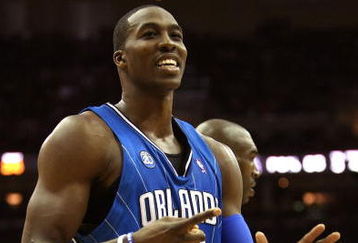 CLEVELAND - MAY 20: Dwight Howard #12 of the Orlando Magic reacts between plays against the Cleveland Cavaliers in Game One of the Eastern Conference Finals during the 2009 Playoffs at Quicken Loans Arena on May 20, 2009 in Cleveland, Ohio. NOTE TO USER: User expressly acknowledges and agrees that, by downloading and or using this photograph, User is consenting to the terms and conditions of the Getty Images License Agreement  (Photo by Elsa/Getty Images)