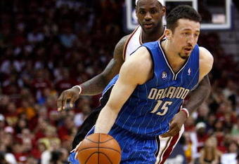 CLEVELAND - MAY 20: Hedo Turkoglu #15 of the Orlando Magic handles the ball against LeBron James #23 of the Cleveland Cavaliers in Game One of the Eastern Conference Finals during the 2009 Playoffs at Quicken Loans Arena on May 20, 2009 in Cleveland, Ohio. NOTE TO USER: User expressly acknowledges and agrees that, by downloading and or using this photograph, User is consenting to the terms and conditions of the Getty Images License Agreement  (Photo by Gregory Shamus/Getty Images)