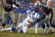 FOXBORO, MA - JANUARY 18:  Linebacker Willie McGinest #55 of the New England Patriots sacks quarterback Peyton Manning #18 of the Indianapolis Colts in the AFC Championship Game on January 18, 2004 at Gillette Stadium in Foxboro, Massachusetts.  (Photo by Al Bello/Getty Images)