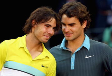 MADRID, SPAIN - MAY 17:  Roger Federer of Switzerland (R) and Rafael Nadal of Spain share a moment during the prize giving ceremony after the mens final during the Madrid Open tennis tournament at the Caja Magica on May 17, 2009 in Madrid, Spain.  (Photo by Clive Brunskill/Getty Images)