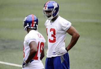 EAST RUTHERFORD, NJ - MAY 09:  Ramses Barden #13 and Hakeem Nicks #18 of the New York Giants works out at rookie camp on May 9, 2009 in East Rutherford, New Jersey.  (Photo by Jeff Zelevansky/Getty Images)