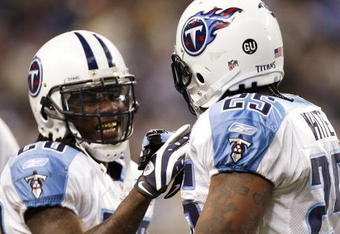 DETROIT , MI - NOVEMBER 27:  LenDale White #25 of the Tennessee Titans celebrates a second quarter touchdown with Chris Johnson #28 while playing the Detroit Lions on November 27, 2008 at Ford Field in Detroit, Michigan.  (Photo by Gregory Shamus/Getty Images)