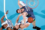 NEW ORLEANS - FEBRUARY 08: Kevin Love #42 of the Minnesota Timberwolves fights for a rebound with Sean Marks #4 of the New Orleans Hornets on February 8, 2009 in New Orleans, Louisiana.  The Hornets defeated the Timberwolves 101-97.  NOTE TO USER: User expressly acknowledges and agrees that, by downloading and/or using this Photograph, user is consenting to the terms and conditions of the Getty Images License Agreement.  (Photo by Chris Graythen/Getty Images)