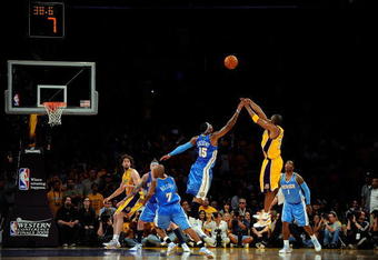 LOS ANGELES, CA - MAY 19:  Kobe Bryant #24 of the Los Angeles Lakers shoots a jumper over Carmelo Anthony #15 of the Denver Nuggets in the fourth quarter of Game One of the Western Conference Finals during the 2009 NBA Playoffs at Staples Center on May 19, 2009 in Los Angeles, California. The Lakers defeated the Nuggets 105-103. NOTE TO USER: User expressly acknowledges and agrees that, by downloading and or using this photograph, User is consenting to the terms and conditions of the Getty Images License Agreement.  (Photo by Kevork Djansezian/Getty Images)