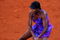 MADRID, SPAIN - MAY 12:  Venus Williams of the US slides to play a backhand to Alisa Kleybanova of Russia in her second round match during the Madrid Open tennis tournament at the Caja Magica on May 12, 2009 in Madrid, Spain.  (Photo by Jasper Juinen/Getty Images)