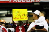 ATLANTA - DECEMBER 10:  A man holds up a sign in support of Michael Vick of the Atlanta Falcons during the game against the New Orleans Saints on December 10, 2007 at the Georgia Dome in Atlanta, Georgia.  The Saints defeated the Falcons 34-14.  (Photo by Chris Graythen/Getty Images)