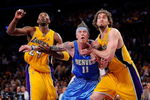 LOS ANGELES, CA - MAY 19:  Kobe Bryant #24 and Pau Gasol #16 of the Los Angeles Lakers box out Chris Andersen #11 of the Denver Nuggets in the fourth quarter of Game One of the Western Conference Finals during the 2009 NBA Playoffs at Staples Center on May 19, 2009 in Los Angeles, California. NOTE TO USER: User expressly acknowledges and agrees that, by downloading and or using this photograph, User is consenting to the terms and conditions of the Getty Images License Agreement.  (Photo by Kevork Djansezian/Getty Images)