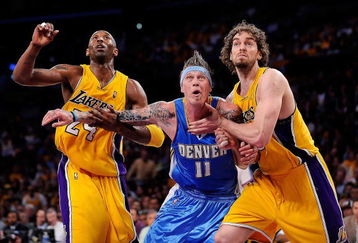 LOS ANGELES, CA - MAY 19:  Kobe Bryant #24 and Pau Gasol #16 of the Los Angeles Lakers box out Chris Andersen #11 of the Denver Nuggets in the fourth quarter of Game One of the Western Conference Finals during the 2009 NBA Playoffs at Staples Center on May 19, 2009 in Los Angeles, California. NOTE TO USER: User expressly acknowledges and agrees that, by downloading and or using this photograph, User is consenting to the terms and conditions of the Getty Images License Agreement.  (Photo by Kevork Djansezian/Getty Images)