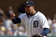DETROIT - AUGUST 26: Joel Zumaya #54 of the Detroit Tigers pumps his fist after teammate Brandon Inge #15 made a play at first base to end the eighth inning against the New York Yankees during their MLB game at the Comerica Park August 26, 2007 in Detroit, Michigan.(Photo By Dave Sandford/Getty Images)