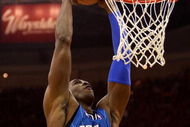 CLEVELAND - MAY 20: Dwight Howard #12 of the Orlando Magic dunks the ball against the Cleveland Cavaliers in Game One of the Eastern Conference Finals during the 2009 Playoffs at Quicken Loans Arena on May 20, 2009 in Cleveland, Ohio. NOTE TO USER: User expressly acknowledges and agrees that, by downloading and or using this photograph, User is consenting to the terms and conditions of the Getty Images License Agreement (Photo by Elsa/Getty Images)