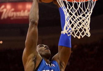 CLEVELAND - MAY 20:  Dwight Howard #12 of the Orlando Magic dunks the ball against the Cleveland Cavaliers in Game One of the Eastern Conference Finals during the 2009 Playoffs at Quicken Loans Arena on May 20, 2009 in Cleveland, Ohio. NOTE TO USER: User expressly acknowledges and agrees that, by downloading and or using this photograph, User is consenting to the terms and conditions of the Getty Images License Agreement  (Photo by Elsa/Getty Images)