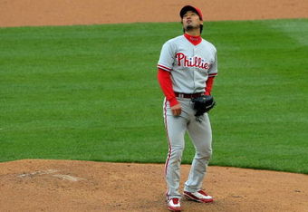 DENVER - APRIL 12:  Starting pitcher Chan Ho Park #61 of the Philadelphia Phillies watches a fly ball as he pitches against the Colorado Rockies at Coors Field on April 12, 2009 in Denver, Colorado. The Phillies defeated the Rockies 7-5.  (Photo by Doug Pensinger/Getty Images)