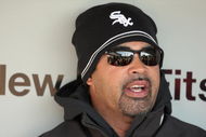 CHICAGO - APRIL 7: Manager Ozzie Guillen #13 of the Chicago White Sox talks with the press in the dugout before the Opening Day game against the Kansas City Royals on April 7, 2009 at U.S. Cellular Field in Chicago, Illinois. (Photo by Jonathan Daniel/Getty Images)
