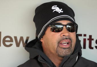 CHICAGO - APRIL 7:  Manager Ozzie Guillen #13 of the Chicago White Sox talks with the press in the dugout before the Opening Day game against the Kansas City Royals on April 7, 2009 at U.S. Cellular Field in Chicago, Illinois. (Photo by Jonathan Daniel/Getty Images) 