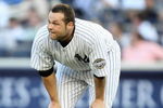NEW YORK - MAY 21:  Joba Chamberlain #62 of the New York Yankees reacts after being hit in the leg by a batter against the Baltimore Orioles on May 21, 2009 at Yankee Stadium in the Bronx borough of New York City.  (Photo by Nick Laham/Getty Images)