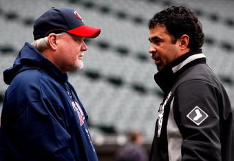 CHICAGO - SEPTEMBER 30:  Manager Ozzie Guillen #13 (R) of the Chicago White Sox and manager Ron Gardenhire #35 of the Minnesota Twins talk during batting practice prior to the American League Central Division Tiebreaker game at U.S. Cellular Field on September 30, 2008 in Chicago, Illinois.  (Photo by Jamie Squire/Getty Images)