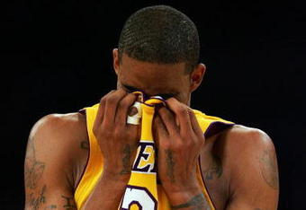 LOS ANGELES, CA - MAY 21:  Trevor Ariza #3 of the Los Angeles Lakers wipes his face in the second half against the Denver Nuggets in Game Two of the Western Conference Finals during the 2009 NBA Playoffs at Staples Center on May 21, 2009 in Los Angeles, California. NOTE TO USER: User expressly acknowledges and agrees that, by downloading and or using this photograph, User is consenting to the terms and conditions of the Getty Images License Agreement.  (Photo by Stephen Dunn/Getty Images)