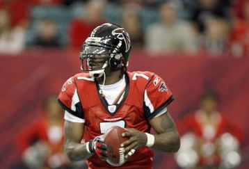 ATLANTA - DECEMBER 24: Quarterback Michael Vick #7 of the Atlanta Falcons looks to pass the ball during the game against the Carolina Panthers on December 24, 2006 at The Georgia Dome in Atlanta,Georgia. (Photo by Marc Serota/Getty Images)