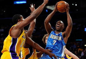 LOS ANGELES, CA - MAY 21:  Chauncey Billups #7 of the Denver Nuggets goes up for a shot over Andrew Bynum #17 and Kobe Bryant #24 of the Los Angeles Lakers in the first half in Game Two of the Western Conference Finals during the 2009 NBA Playoffs at Staples Center on May 21, 2009 in Los Angeles, California. NOTE TO USER: User expressly acknowledges and agrees that, by downloading and or using this photograph, User is consenting to the terms and conditions of the Getty Images License Agreement.  (Photo by Kevork Djansezian/Getty Images)