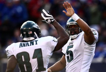EAST RUTHERFORD, NJ - JANUARY 11:  Donovan McNabb #5 of the Philadelphia Eagles celebrates with Jason Avant #81 after scoring a touchdown against the New York Giants during the NFC Divisional Playoff Game on January 11, 2009 at Giants Stadium in East Rutherford, New Jersey.  (Photo by Chris McGrath/Getty Images)
